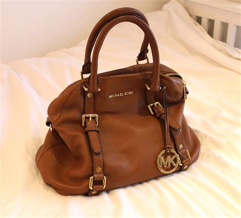 how much is a used michael kors purse|michael kors purses prices.